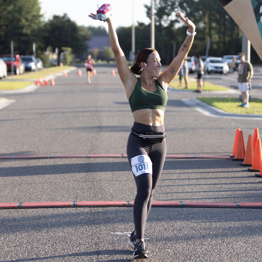 Runner Crossing Finish Line