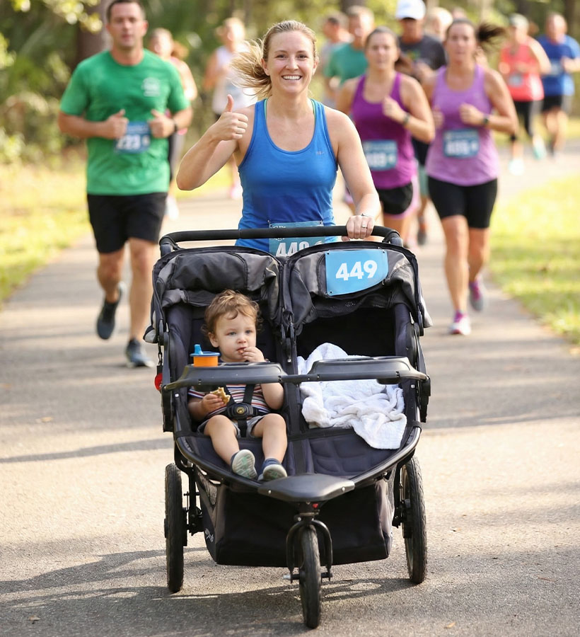 Mom Running With Toddler With Stroller